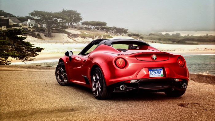 Red Alfa Romeo 4C Spider Cabriolet on Beach Road