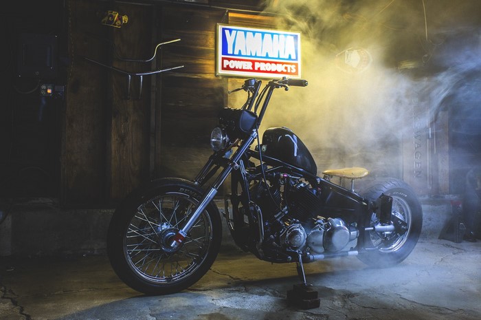 Custom Yamaha V Star motorcycle in garage