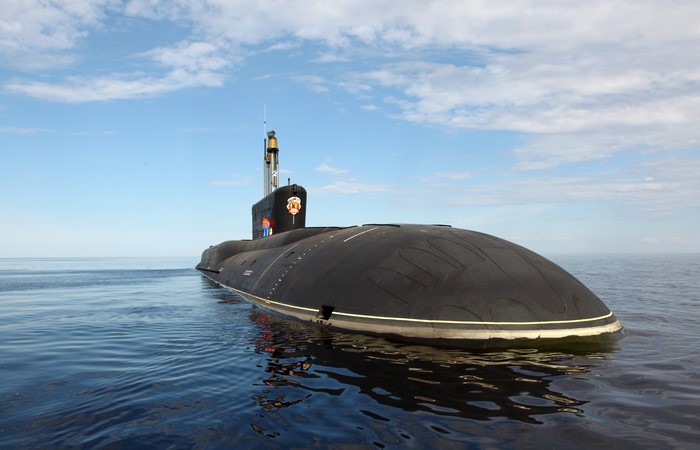 Submarine on the water under a cloudy sky