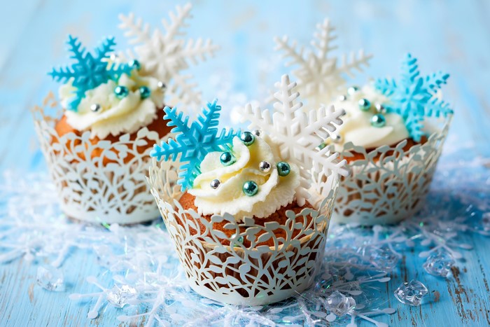 Three Christmas cupcakes with snowflakes