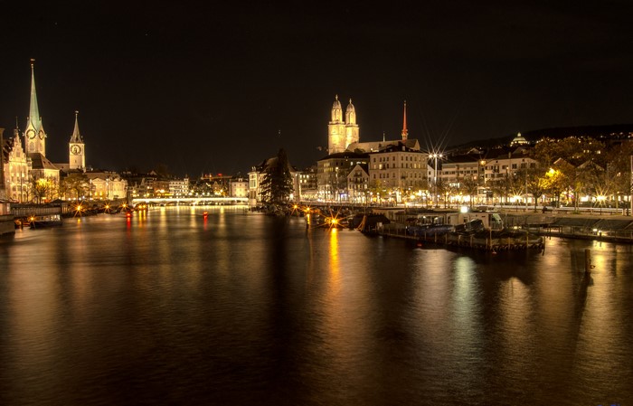 Zurich at night with river and churches