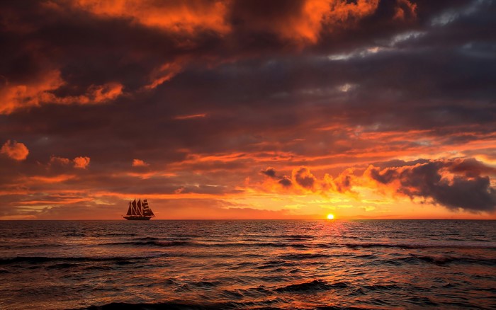 Sailboat on the sea during sunset