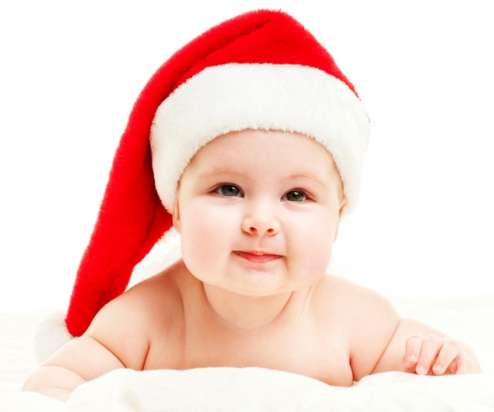 Baby wearing a Santa hat