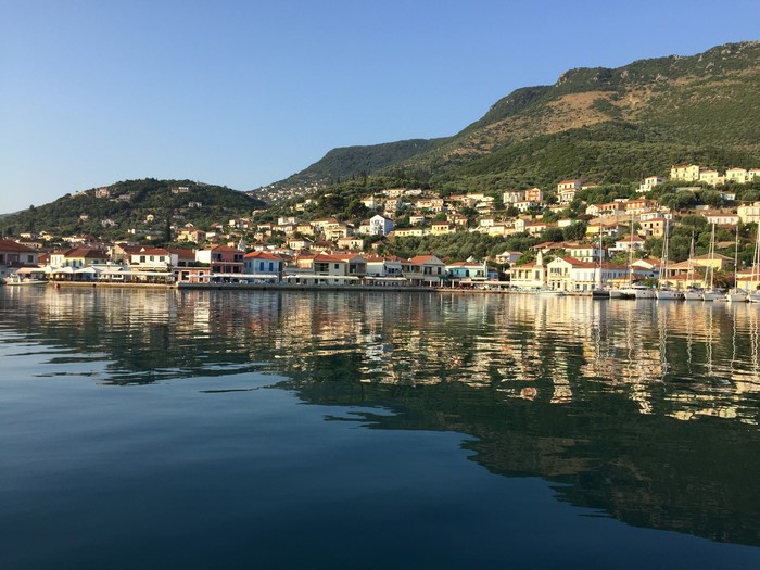 Coastal town with houses on a hill in Greece