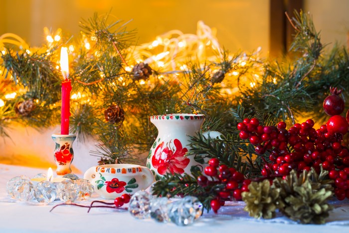 Christmas Decorations with Candles and Pine Cones