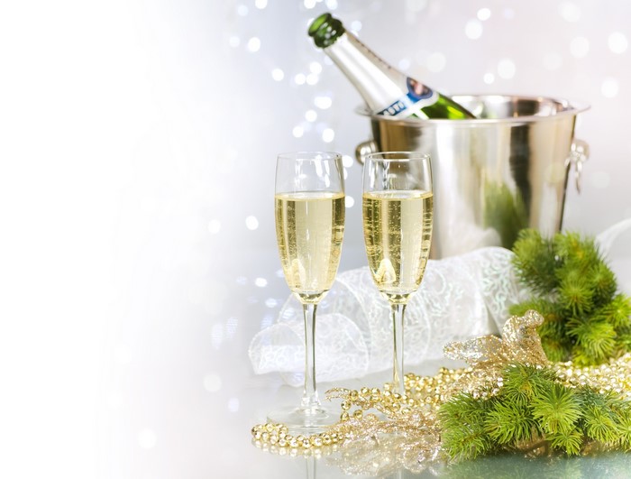 Champagne bottle and glasses with Christmas decorations