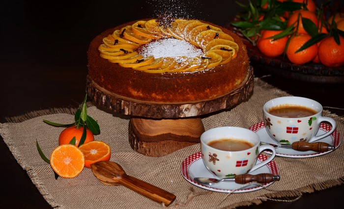 Orange cake with coffee and mandarins