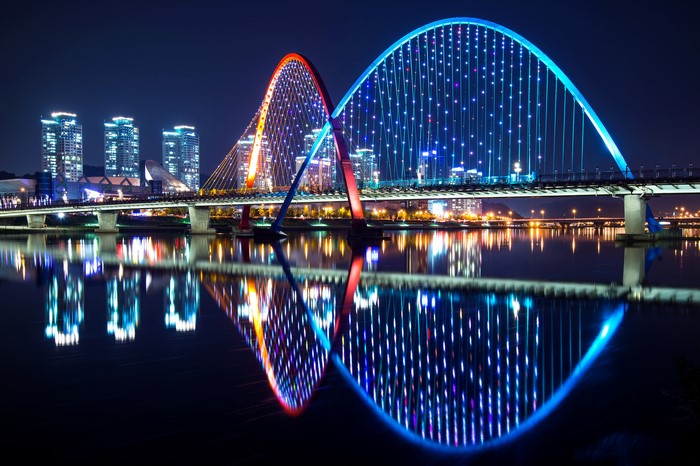 Illuminated Arched Bridges Over River at Night in Daejeon, South Korea