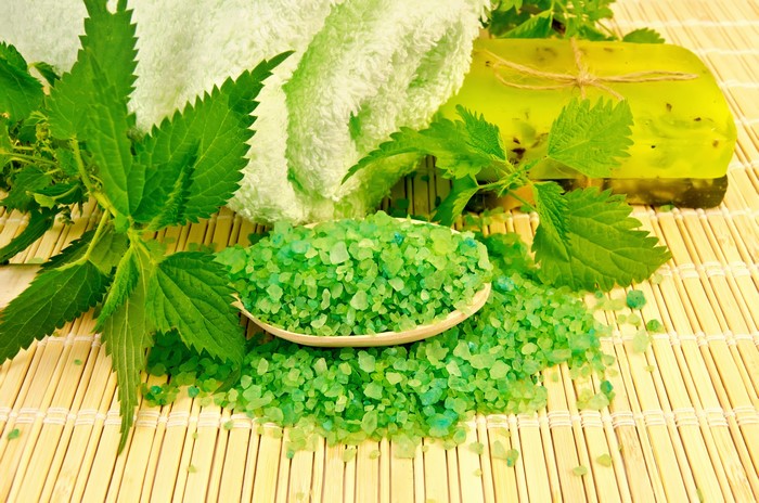 Spa with green nettle, soap, and bath salts