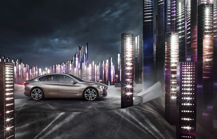 BMW Concept Compact Sedan in futuristic city