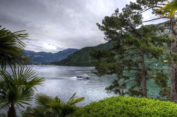 Motorboat on Lake Como, Italy with Mountains
