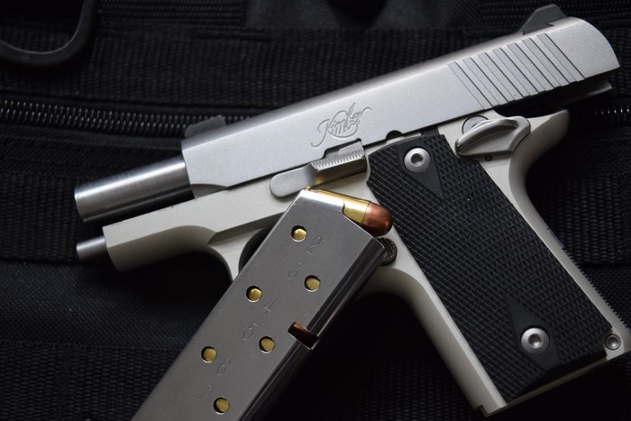 Kimber Micro 380 pistol with magazine and cartridge