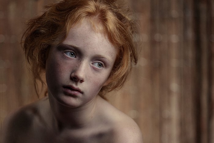 Redhead girl Jamie looking away