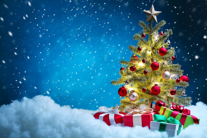 Christmas tree with gifts and snow