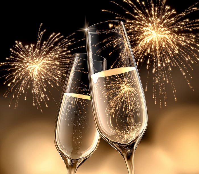 Champagne Glasses and Fireworks