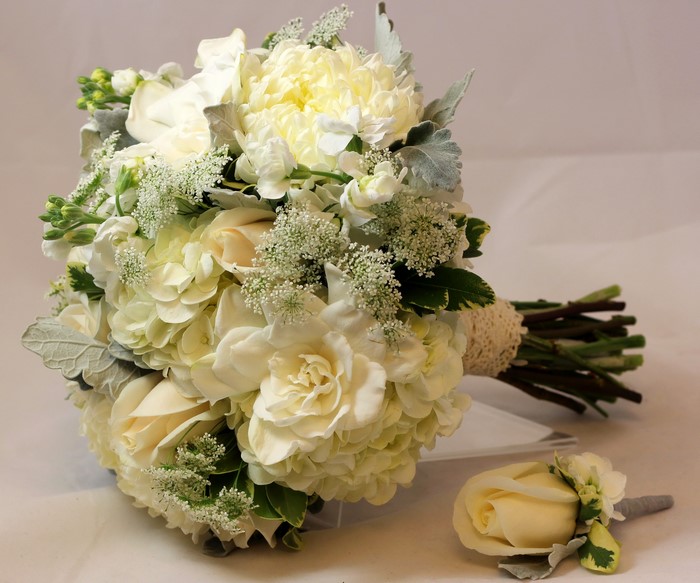 White wedding bouquet and boutonniere