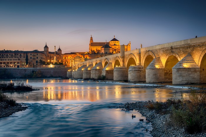 Roman Bridge and Mosque-Cathedral of Cordoba at dusk