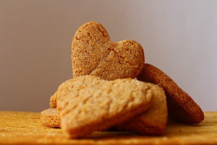 Heart-shaped cookies on a wooden surface