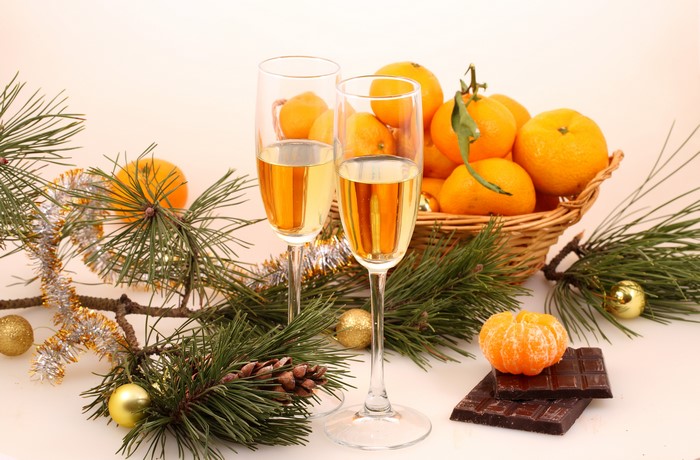 Champagne, Mandarins, Chocolate, and Pine Branches