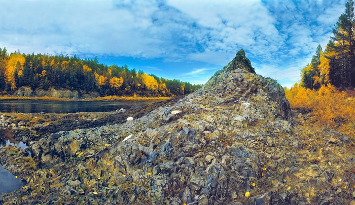 Autumn forest and river landscape in the Urals, Russia