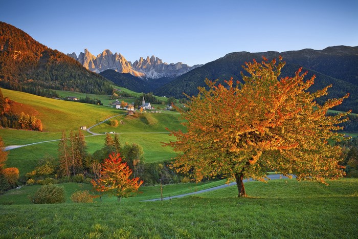 Autumn landscape with mountains and a village