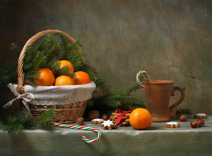 Christmas still life with tangerines, cookies, and candy canes