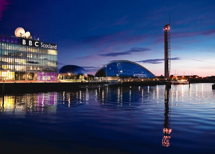 BBC Scotland building and Glasgow landmarks at night