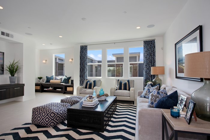 Living room with patterned rug and armchairs