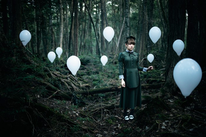 The Soul Taker in a Forest with Balloons