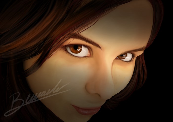 Brown haired woman's face with brown eyes