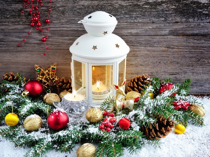Christmas lantern with ornaments and pine cones