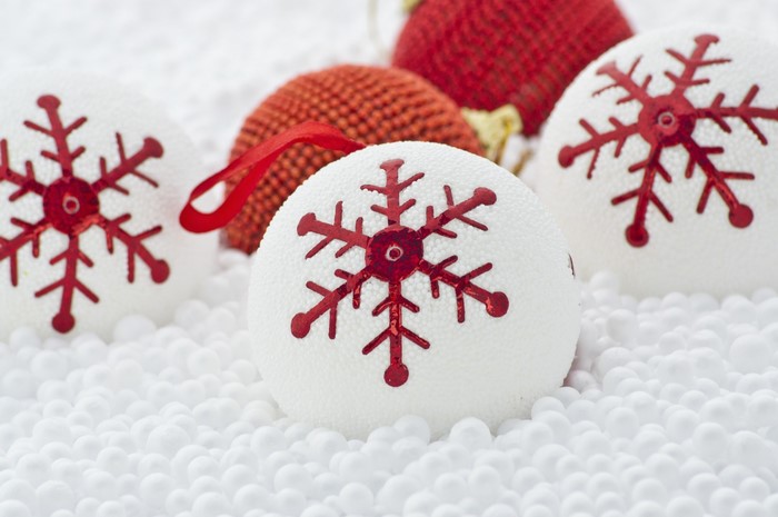 Christmas ornaments with snowflakes on white background