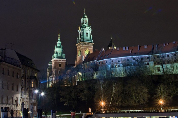 Wawel Castle in Krakow at night with street lights