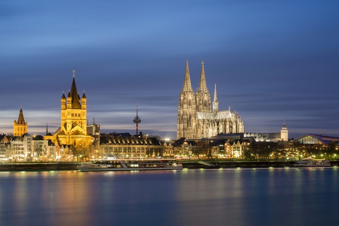 Cologne Cathedral and skyline at night over the Rhine River