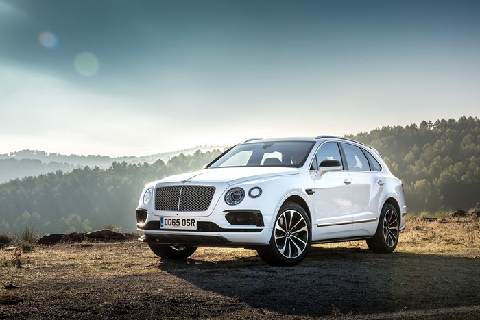 4K 2015 Bentley Bentayga SUV in a landscape