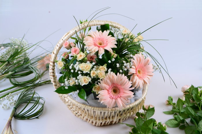 Pink Gerbera and Rose Flower Arrangement in Wicker Basket