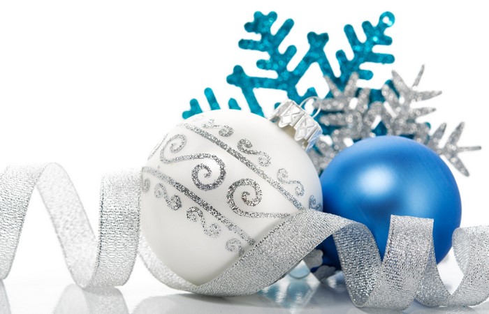 Christmas ornaments with ribbon and snowflakes