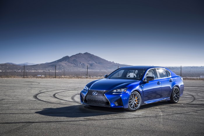 Blue 2016 Lexus GS F on asphalt with mountains