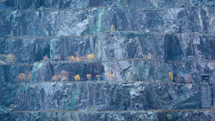 Terraced slate quarry with autumn trees