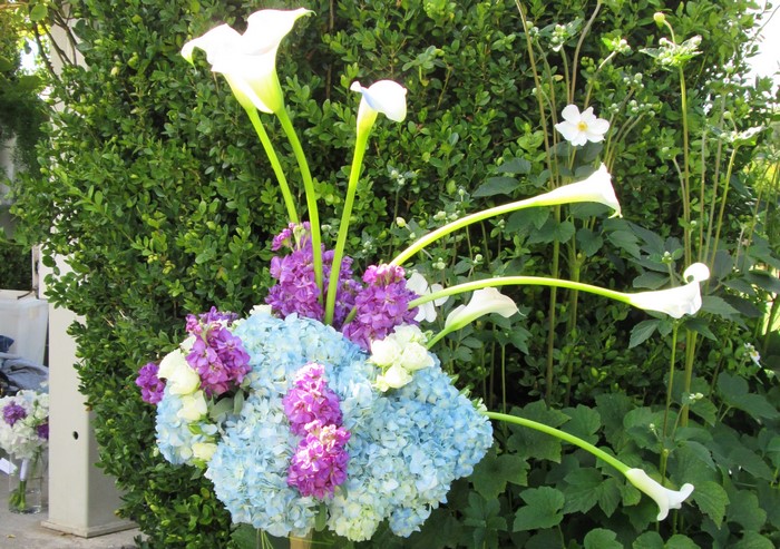 Calla lilies, hydrangea, and matthiola floral arrangement