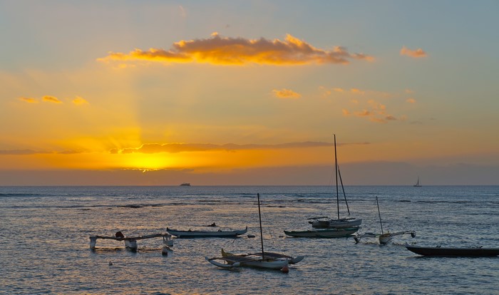 Boats on the sea at sunset