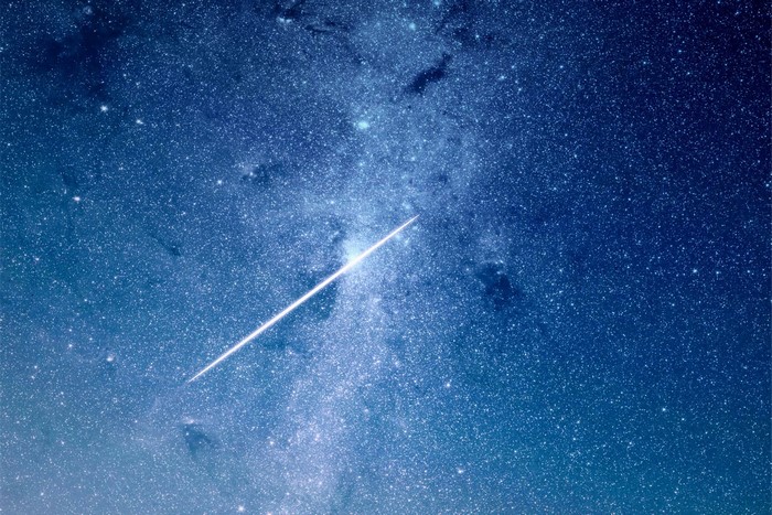 Shooting star in a starry night sky