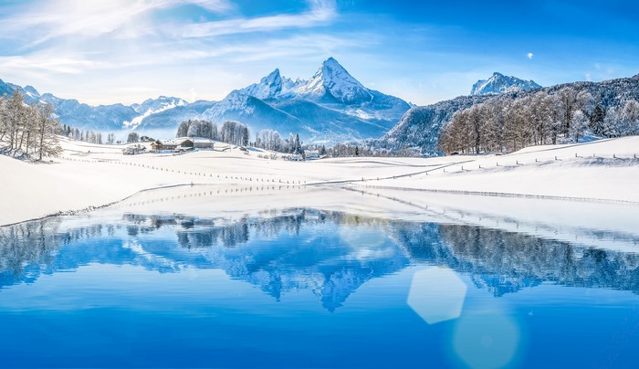 4K Winter Scenery with Snow-Capped Mountains and Lake Reflection
