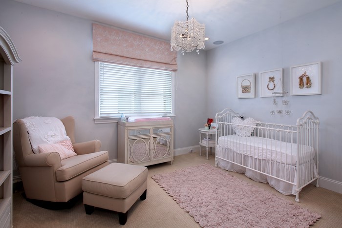 Nursery with Crib, Armchair, and Chandelier
