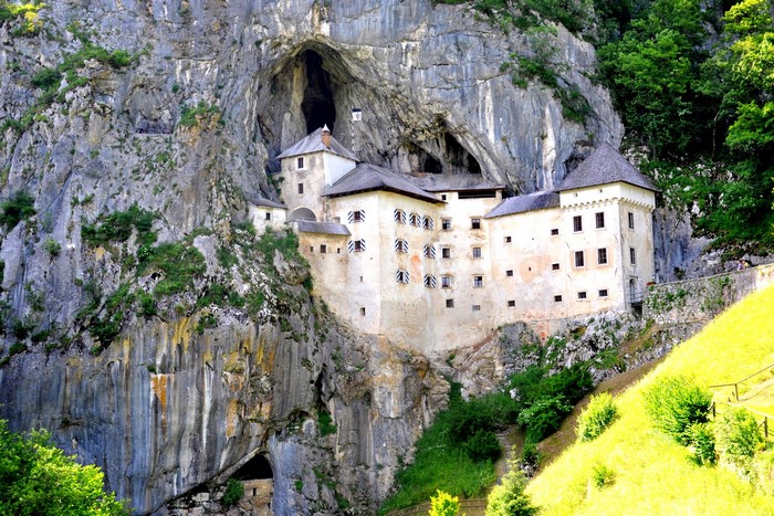 Predjama Castle built into a cliff face in Slovenia