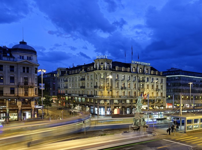 Hotel Schweizerhof Zurich at dusk with light trails