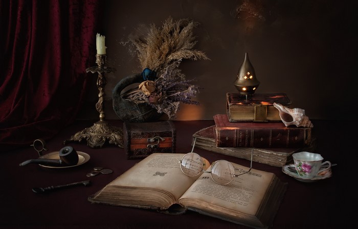 Still life with books, pipe, and candle