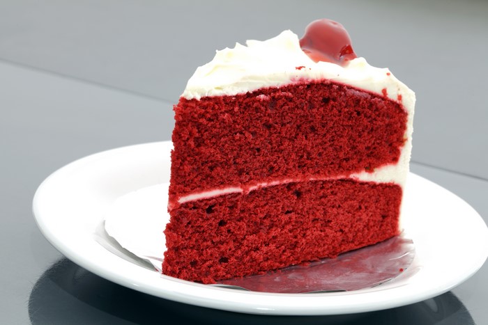 Slice of Red Velvet Cake with Cherry