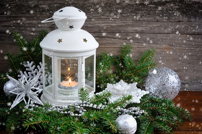 Christmas lantern with candle and ornaments