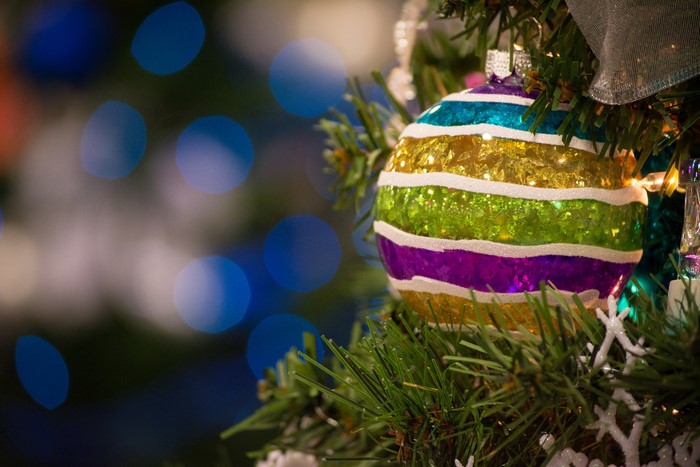 Christmas ornament on a tree with bokeh lights